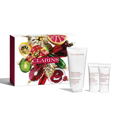 Clarins Moisture-Rich 4 Piece Gift Set: Body Lotion 200ml - Body Scrub 30ml - Hand  Nail Treatment 30ml - Pouch n/a Clarins