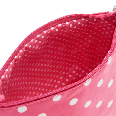 inside of small red polka dot make-up bag with dotty lining