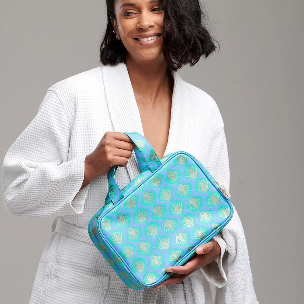 folding wash bag held by woman